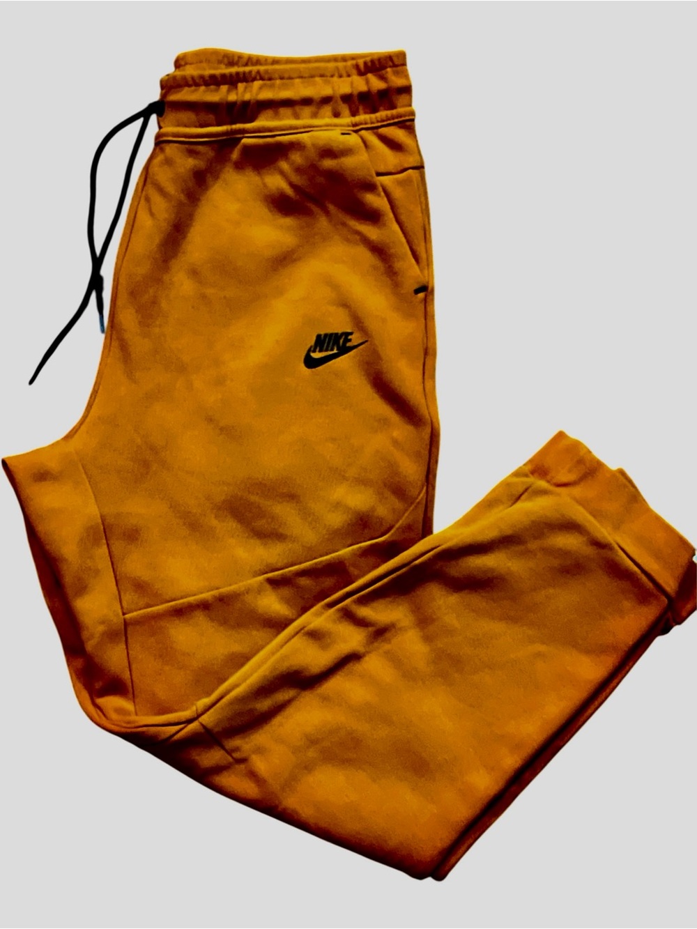 Nike Kids Burnt Orange Joggers with Black Logo